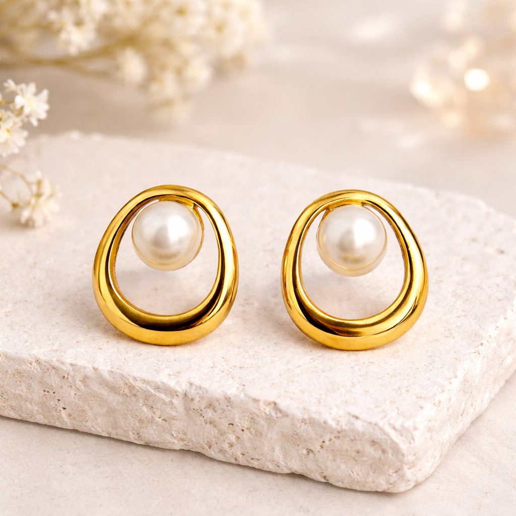 Golden orbit pearl studs