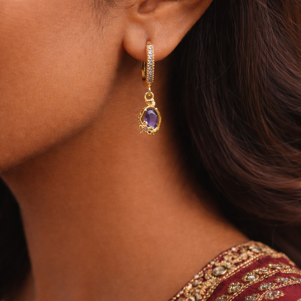 Gold Huggie Earrings with Purple Teardrop Crystal